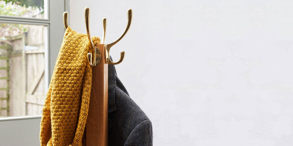 Header image of Coat Stand with brass hooks in use