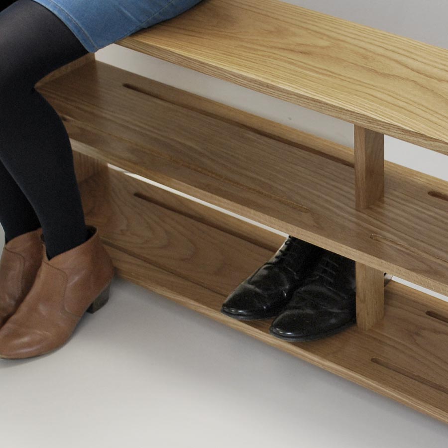 Close up of an Oak Shoe Bench with two shelves and shoes in place, part of our Oak Furniture Collection