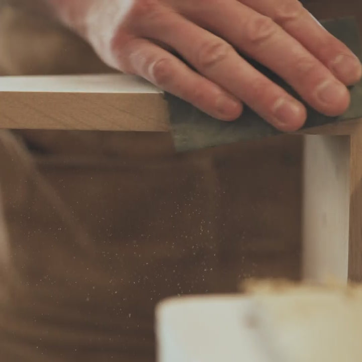 Video of hands sanding an Oak Coat Stand in the Boot & Saw workshop